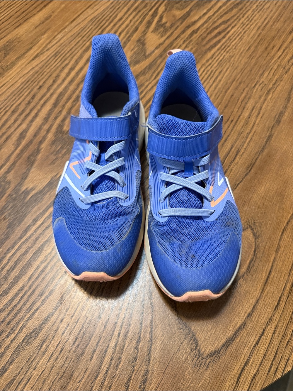 New Balance Blue Kids Sneakers with Pink Accents